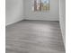 Bright bedroom with gray flooring, a window, and white walls at 4940 Spring Run Ave, Orlando, FL 32819