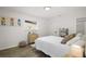 Cozy bedroom with natural light, modern decor, and a minimalist design at 5334 Mary Ann Ln, Orlando, FL 32810