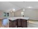 Kitchen island is the focal point between the kitchen and living room at 57 Pine Trace Crse, Ocala, FL 34472