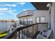 Balcony with seating provides scenic views of the lake and the surrounding city at 6165 Carrier Dr # 2001, Orlando, FL 32819
