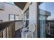 Enjoy the spacious balcony with seating, offering a serene outdoor space in this beautiful property at 6165 Carrier Dr # 2001, Orlando, FL 32819
