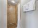 Tiled shower with shower curtain, and hotel-style towel rack, and adjustable shower head at 6165 Carrier Dr # 2001, Orlando, FL 32819