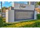 Exterior shot of The Enclave Hotel & Suites sign with address 6165 at 6165 Carrier Dr # 2001, Orlando, FL 32819