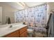 Standard bathroom with a shower/tub combo with lighthouse-themed shower curtain at 625 Waterland Ct, Orlando, FL 32828