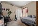 This cozy bedroom offers a comfy bed, ample closet space, and a peaceful atmosphere for relaxation and rest at 625 Waterland Ct, Orlando, FL 32828