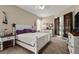 Comfortable bedroom with a bed, white furniture, and a sliding glass door at 625 Waterland Ct, Orlando, FL 32828
