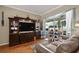 Large living room with a TV and comfortable couches and chairs at 625 Waterland Ct, Orlando, FL 32828