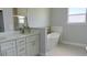 Elegant bathroom features a soaking tub, double vanity and modern fixtures at 6345 Sw 155Th Pl, Ocala, FL 34473