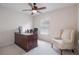 Home office with a desk, chair, and natural light at 743 Lake Douglas Dr, Groveland, FL 34736