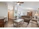 Inviting living room with vaulted ceilings, hardwood floors, and an open-concept design at 743 Lake Douglas Dr, Groveland, FL 34736