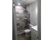 Contemporary bathroom featuring tiled shower and modern vanity at 769 Avenue Q Se, Winter Haven, FL 33880