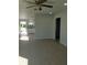 Open-concept living area with hardwood floors at 769 Avenue Q Se, Winter Haven, FL 33880
