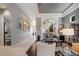Hallway with architectural details that connects the living areas of this home at 8161 Via Rosa, Orlando, FL 32836