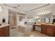 Main bathroom featuring a soaking tub, walk-in shower, double vanities and tiled flooring at 8161 Via Rosa, Orlando, FL 32836