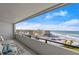 Condo balcony with seating, ocean view, offering a serene retreat at 901 S Atlantic Ave # 3, Ormond Beach, FL 32176