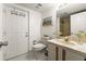 Cozy bathroom featuring a toilet, sink, and decorative fish accents at 901 S Atlantic Ave # 3, Ormond Beach, FL 32176