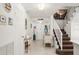 Welcoming entryway with stairs, tiled floors, and decorative accents, showcasing a cozy beach-style decor at 901 S Atlantic Ave # 3, Ormond Beach, FL 32176