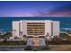 Elegant condo building boasting ocean views, lush landscaping, and convenient underground parking at 901 S Atlantic Ave # 3, Ormond Beach, FL 32176