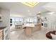 Bright, open-concept living space combining kitchen, dining, and living areas with ample natural light at 901 S Atlantic Ave # 3, Ormond Beach, FL 32176