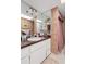 This bathroom features a vanity with a sink, a mirror, and a shower area with a curtain at 908 Hillary Ct # 15, Orlando, FL 32804