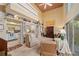 Spacious living area with high ceilings, clerestory windows, built-in shelving, and a seamless connection to the kitchen at 908 Hillary Ct # 15, Orlando, FL 32804