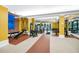 Spacious gym with weight machines, free weights, and mirrored walls for a complete workout at 911 N Orange Ave # 541, Orlando, FL 32801