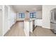 Kitchen with breakfast bar provides seamless transition to the adjacent living area at 911 N Orange Ave # 541, Orlando, FL 32801