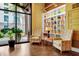 Inviting lobby featuring comfortable seating, a bookshelf with colorful decorations and a large window with natural light at 911 N Orange Ave # 541, Orlando, FL 32801