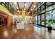 Spacious lobby with a seating area, decorative bookcase, and a welcoming entrance at 911 N Orange Ave # 541, Orlando, FL 32801