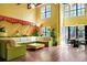 Relaxing lounge area featuring a comfortable sectional sofa, plants, and ample natural light at 911 N Orange Ave # 541, Orlando, FL 32801