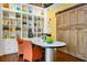 Office space featuring a large white bookshelf and a sliding wooden door at 911 N Orange Ave # 541, Orlando, FL 32801