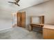 This bedroom includes closet space, a desk, and neutral walls at 610 Palomas Ave, Ocoee, FL 34761