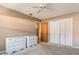 Spacious bedroom with plush carpet and ample storage with large closet at 610 Palomas Ave, Ocoee, FL 34761