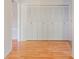 Hallway view featuring a full wall of spacious closets at 610 Palomas Ave, Ocoee, FL 34761
