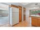 Well-lit kitchen showcases appliances, wood cabinets, and a convenient breakfast bar at 610 Palomas Ave, Ocoee, FL 34761