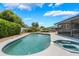 Inviting pool and spa, perfect for relaxation in this beautiful backyard at 610 Palomas Ave, Ocoee, FL 34761