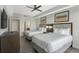 Serene bedroom with two beds, modern decor, and soothing color palette, and ensuite at 14501 Grove Resort Ave # 3735, Winter Garden, FL 34787