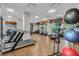 Spacious fitness center with modern equipment and ample workout space at 14501 Grove Resort Ave # 3735, Winter Garden, FL 34787