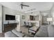 Comfortable living area with an open floor plan leading to the kitchen and dining area, perfect for relaxation at 14501 Grove Resort Ave # 3735, Winter Garden, FL 34787