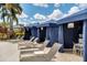 Inviting poolside cabanas with comfortable lounge chairs for relaxing at 14501 Grove Resort Ave # 3735, Winter Garden, FL 34787