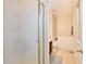 Bright bathroom featuring a walk-in shower, soaking tub, and neutral tile flooring at 14717 Royal Poinciana Dr, Orlando, FL 32828