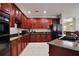 Well-equipped kitchen features sleek countertops, ample cabinet space, and stainless steel appliances at 14717 Royal Poinciana Dr, Orlando, FL 32828