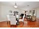 Inviting living room featuring a glass table with chairs and comfortable couches, great for relaxing at 14717 Royal Poinciana Dr, Orlando, FL 32828
