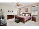 Bedroom with plush carpet, a ceiling fan, and lots of natural light at 14717 Royal Poinciana Dr, Orlando, FL 32828