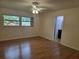 Bedroom with hard wood flooring, ceiling fan and window at 217 Longleaf Ct, Orlando, FL 32835
