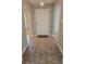Welcoming entryway featuring neutral walls, tile flooring and a stylish front door mat at 217 Longleaf Ct, Orlando, FL 32835