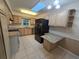 Bright kitchen with stainless steel appliances and granite countertops with neutral-toned cabinetry at 217 Longleaf Ct, Orlando, FL 32835