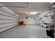 Spacious garage with epoxy flooring and plenty of storage shelving at 611 San Raphael St, Kissimmee, FL 34759