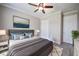 Cozy bedroom featuring modern decor, a comfortable bed, and ample closet space, creating a welcoming retreat at 611 San Raphael St, Kissimmee, FL 34759