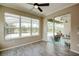 The living room offers great views of the pool area through large windows and sliding glass doors at 611 San Raphael St, Kissimmee, FL 34759